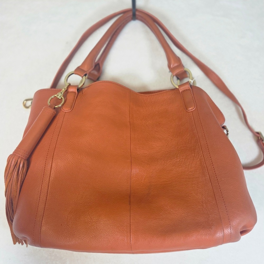 Burnt Orange Pebbled Leather Hobo Bag with Tassel and Shoulder Strap Womens